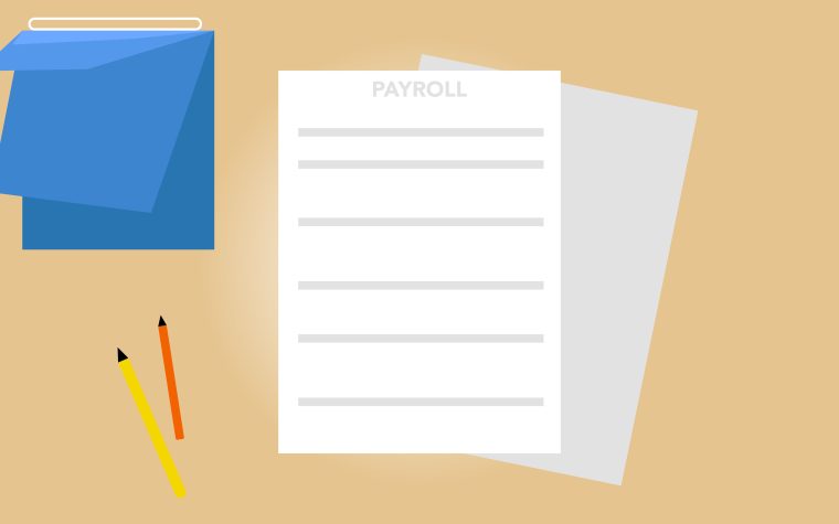 Documents de paie posés sur un bureau